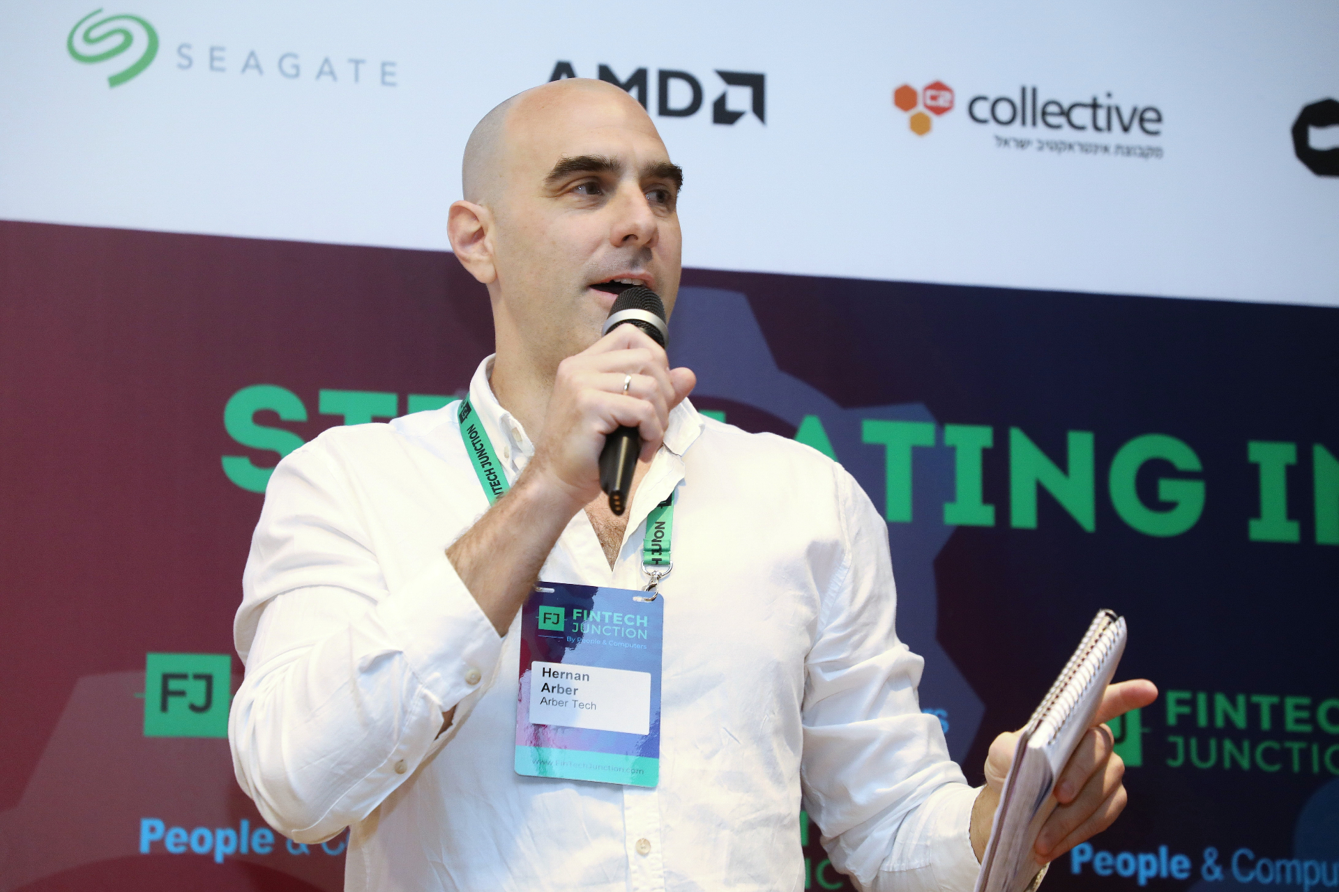 Hernan speaking at fintech conference